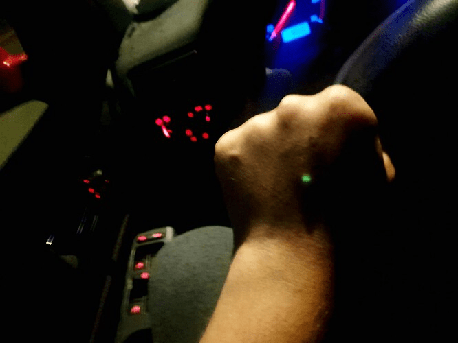 Implant in Hand showing its Glow in the Night