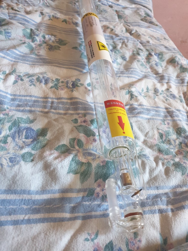 CO2 laser tube for a DIY laser sealer, designed for crafting and sealing glass implants in biohacking projects.