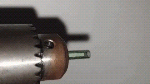 Lathe turning and sealing a DIY implant, showcasing the precision and technique used in biohacking projects for implant modification.